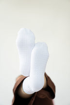 Lavoréa Pilates Grip Socks in Pink, close view of the silicone grip across the sole