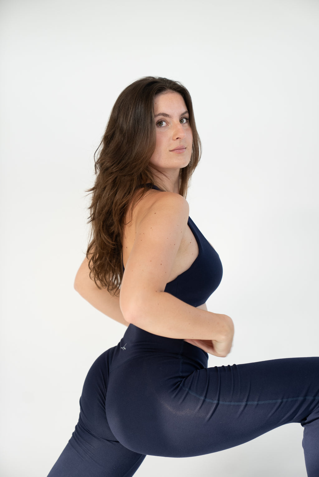 Lavoréa Wrap Waist Flare Leggings in Navy Blue, organic cotton, worn in movement