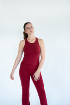 Lavoréa Wrap Waist Flare Leggings in Burgundy worn with the Classic Racerback Top, organic cotton