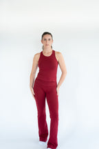 Lavoréa Wrap Waist Flare Leggings in Burgundy, organic cotton, worn with the Classic Racerback Top